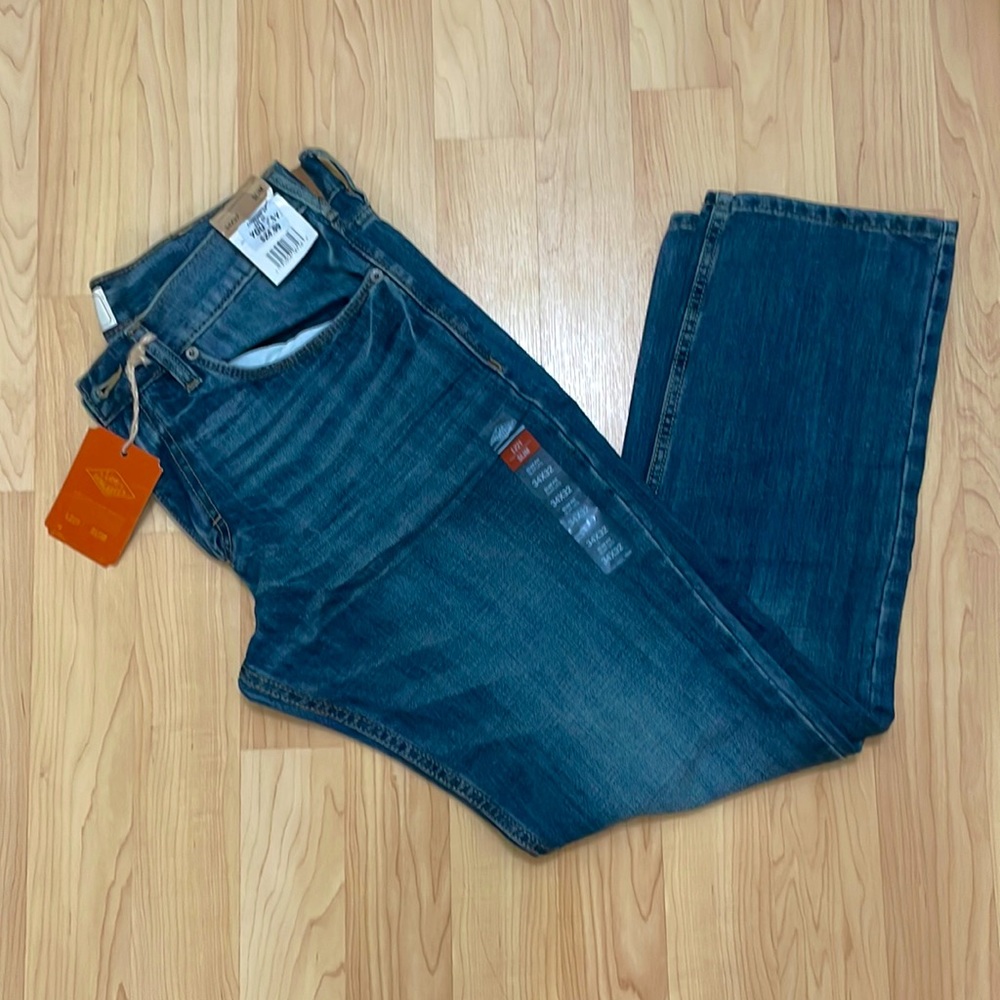 Lee dungarees. Size 34x32. New with tags.